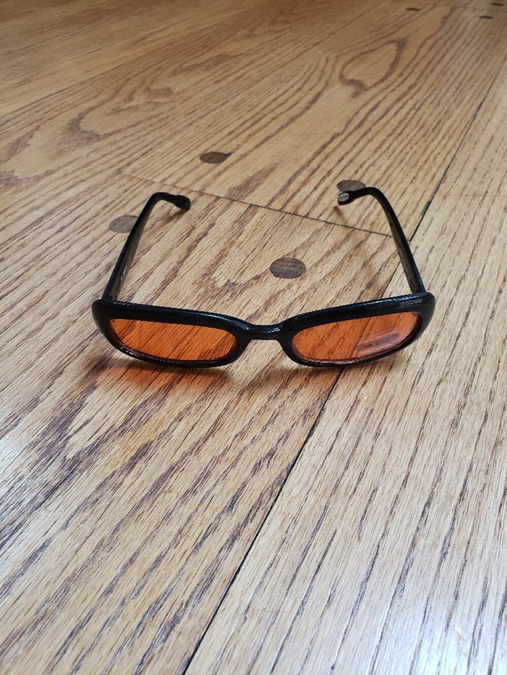Vintage 90s Black Oval Sunglasses Orange Tinted Lens NOS